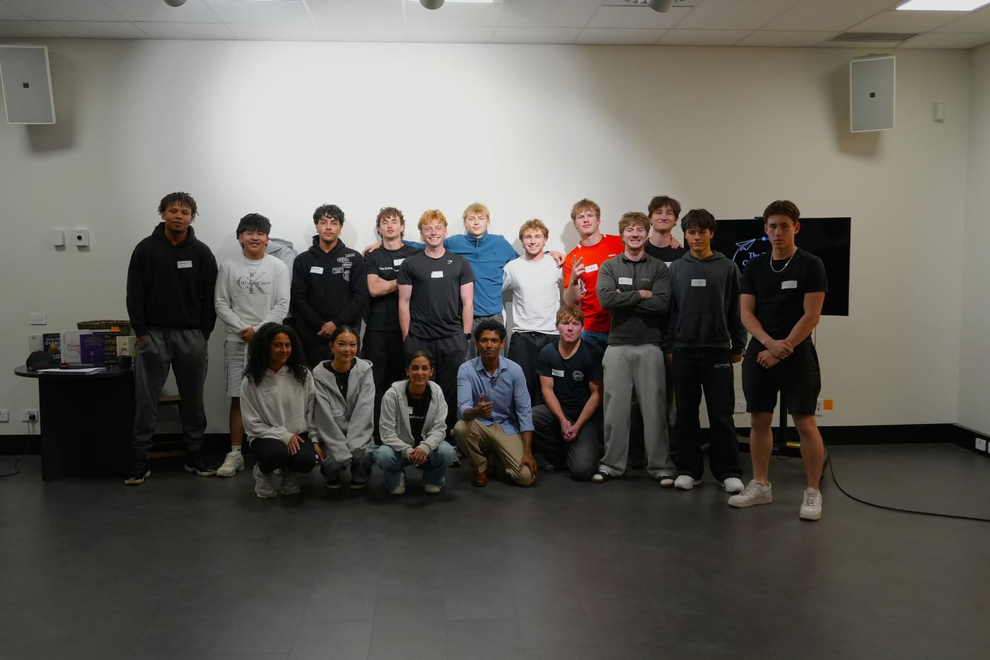 A group photo of participants and facilitators at the end of a session in Canberra